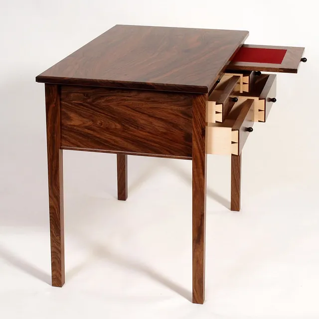 walnut table with drawers open