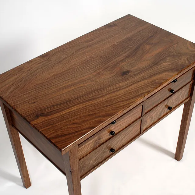 walnut table with four drawers 